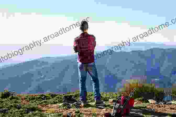 A Walker Enjoying Breathtaking Views From A Hilltop In The Eden Valley, With Rolling Hills And A Distant Village In The Background Nine Great Walks From Ravenstonedale (Walking In Kirkby Stephen District 2)