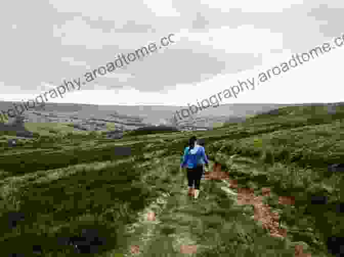 Image Of A Hiker Walking Along A Path In The North Yorkshire Moors 50 Walks In North Yorkshire (AA 50 Walks)