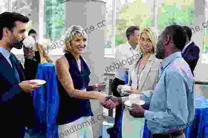 Photographer Engaging With Customers At A Networking Event Running A Successful Photography Business